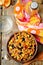 Black beans, quinoa and corn chili on a wood background