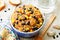 Black beans, quinoa and corn chili on a wood background