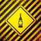 Black Beer bottle icon isolated on yellow background. Warning sign. Vector Illustration