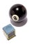 Black billiard ball and chalk