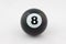 Black billiard ball number eight isolated on white