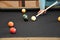 Black billiard table, Playing billiard - Close-up shot of a man playing billiard