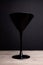 Black on black: one elegant balck glass martini glass on black t