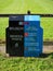 Black and blue general waste bin in a park