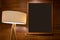 Black board with wooden frame and modern circle lamp