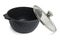 Black boiling pan with non-stick coating stands on white background