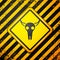 Black Buffalo skull icon isolated on yellow background. Warning sign. Vector Illustration