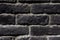 Black building brick background