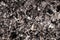 Black burnt embers close up background texture