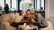 Black Businesswomen shaking hands with manager sitting on couch