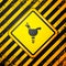 Black Candy cockerel lollipop on a stick icon isolated on yellow background. Warning sign. Vector