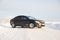 Black car on winter snowy road . Winter road. Journey. Russia, Gatchina 22 January 2019