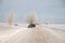 Black car on winter snowy road . Winter road. Journey. Russia, Gatchina 22 January 2019