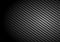 Black carbon kevlar fiber background and texture with lighting