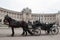 Black carriage near the castle Hofburg.