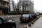 Black cars, private cars waiting for tourists in front of Radisson Hotel in downtown Bucharest, Romania, 2020