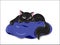 Black cat on blue pillow