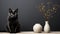 A black cat sitting next to two white vases