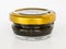 Black caviar in a glass jar with a golden lid on a white background. Sturgeon caviar, fish delicacy