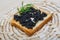 Black caviar toast