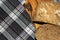 Black cereal bread arranged on a cutting board