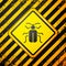 Black Chafer beetle icon isolated on yellow background. Warning sign. Vector