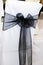 Black chair cover at wedding