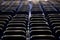 Black chairs in big empty congress room