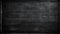 Black Chalkboard Background depicts a black chalkboard, representing a classic writing surface. The horizontal board is empty and