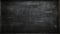 Black Chalkboard Background depicts a black chalkboard, representing a classic writing surface. The horizontal board is empty and