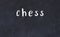 Black chalkboard with inscription chess on in