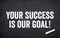 Black chalkboard with message Your success is our goal