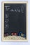 Black chalkboard with wooden frame.