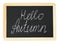 Black chalkboard with wooden frame and lettering Hello Autumn