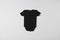 Black child bodysuit isolated over grey background