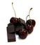 Black chocolate lump and dark large cherry isolated on white