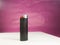 black cigarette lighter on a white surface