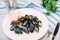 Black clams boiled in white wine sauce