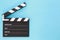 Black clapperboard with free space for text isolated on color background