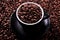 Black coffee cup scattered beans background top view