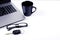 Black coffee cups and car key eyeglasses labtop computer for Life technology concept