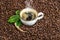 Black coffee green leaves caffee beans background