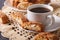 Black coffee and Italian cookies cantuccini macro. Horizontal