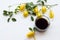 Black coffee with yellow flower ylang ylang local flora of asia