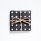 Black color cross pattern gift box on white background