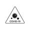 Black coronavirus warning sign with a virus logo and an acronym of covid-19