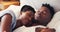 Black couple, bedroom and sleeping with hug, embrace or love for relationship, care and romance. Romantic, touch and bed