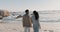 Black couple, walking and beach with back, love and care together by the sea by water. Happy, freedom and vacation with