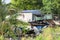 A black crow on an abandoned wooden boat