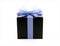 black cube shape cardboard gift box with glittering purple color ribbon and net tied bow isolated on white background